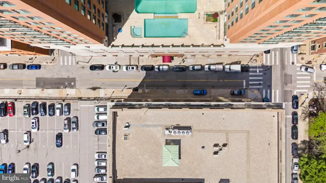 a view of a hallway with wooden shelves