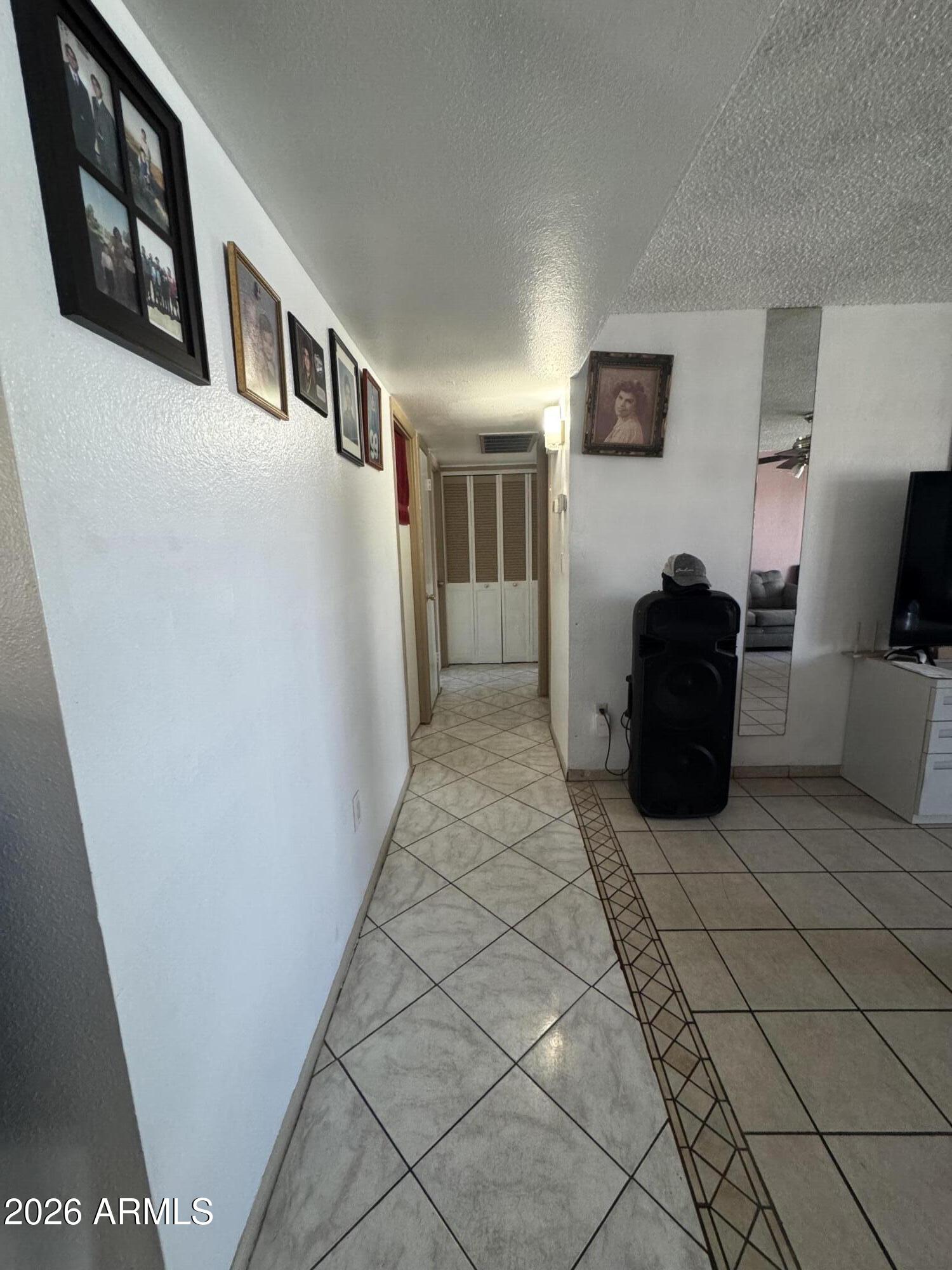 4945 West Berkeley Road Phoenix, AZ 85035 - Photo 5 of 8 Hallway to bedrooms