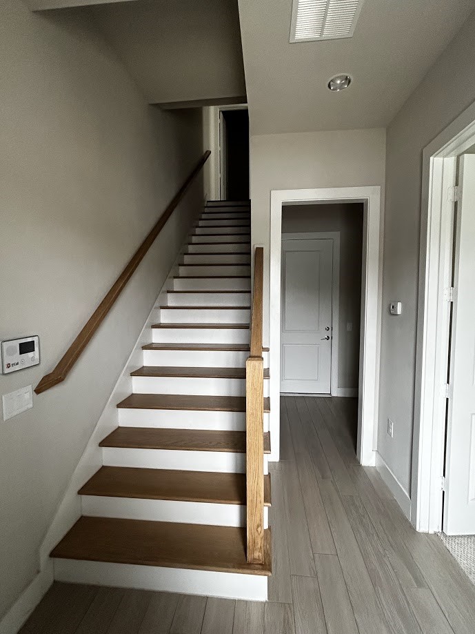 1312 Tinnin Ford Road Austin, TX 78741 - Photo 3 of 12 a view of entryway and hall with wooden floor