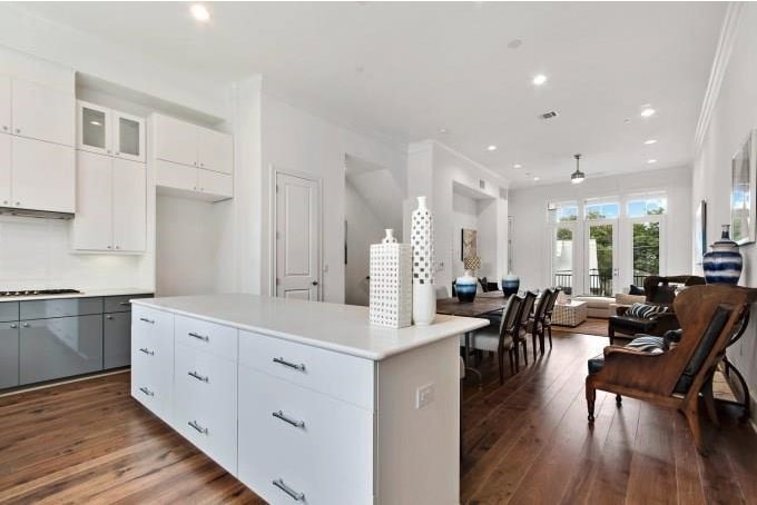 1312 Tinnin Ford Road Austin, TX 78741 - Photo 5 of 12 a very nice looking living room with wooden floor and furniture