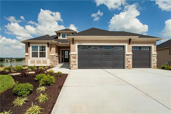 $670,000 | 1628 Hanover Lane, Raymore, MO 64083