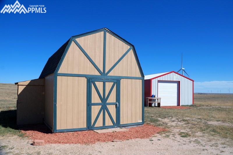 29360 Hanisch Road Calhan, CO 80808 - Photo 27 of 34 Shed with generator lean-to.
