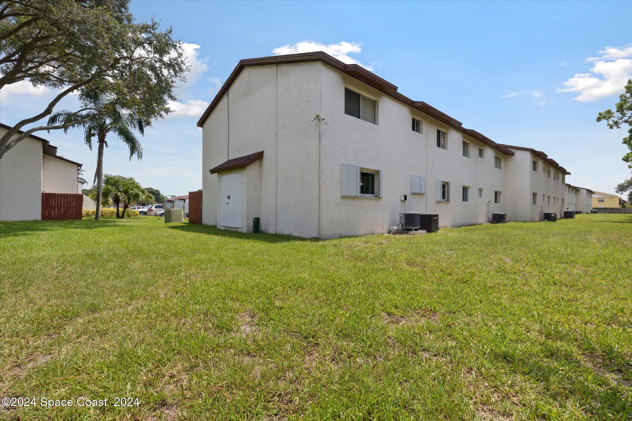 712 Ridge Club Drive Melbourne, FL 32934 - Photo 29 of 32 Hurricane shutter - Exterior view