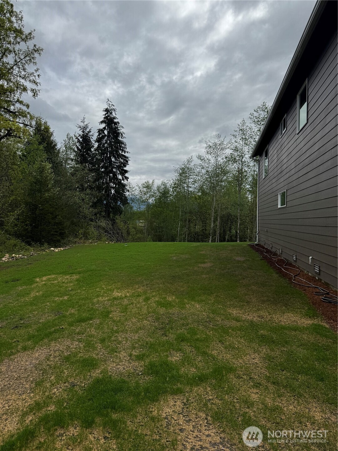 8657 Trillium Lane Concrete, WA 98237 - Photo 24 of 28 a view of a backyard