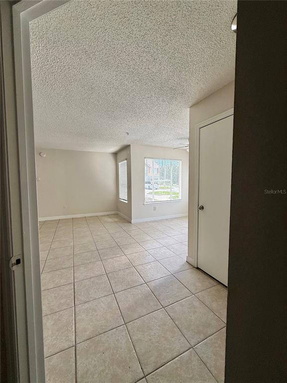 2201 Key W Court, Unit 314 Kissimmee, FL 34741 - Photo 19 of 58 a view of an empty room and window