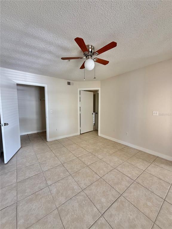 2201 Key W Court, Unit 314 Kissimmee, FL 34741 - Photo 25 of 58 a view of an empty room and window