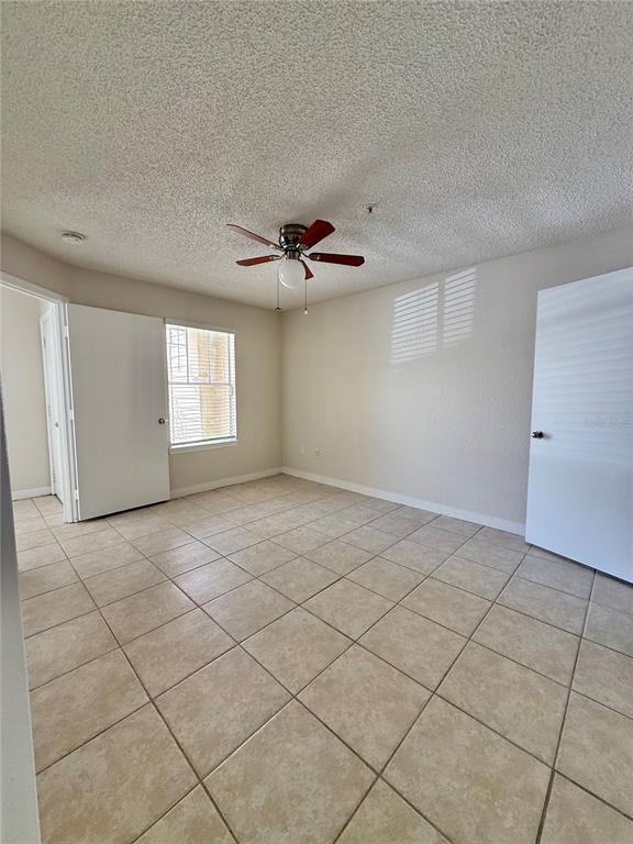2201 Key W Court, Unit 314 Kissimmee, FL 34741 - Photo 26 of 58 a view of an empty room with a window