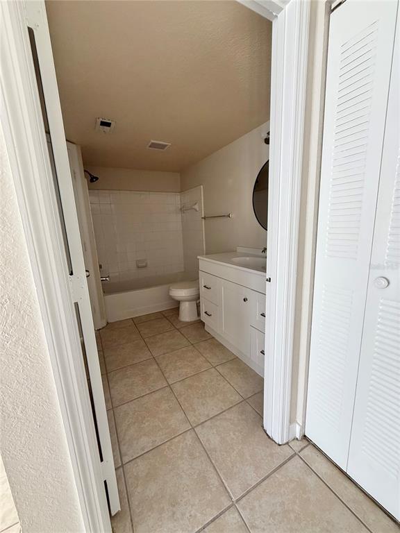 2201 Key W Court, Unit 314 Kissimmee, FL 34741 - Photo 29 of 58 a view of bathroom with a sink and mirror