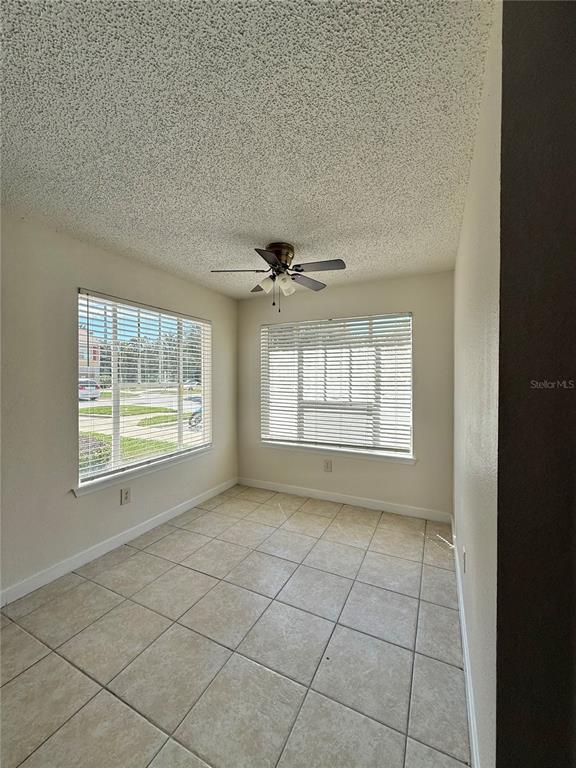 2201 Key W Court, Unit 314 Kissimmee, FL 34741 - Photo 33 of 58 a view of an empty room with a window
