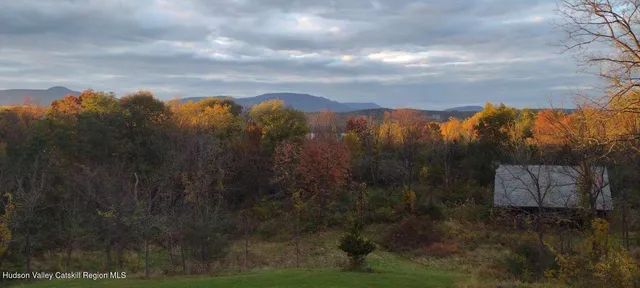 a view of a lake with a yard