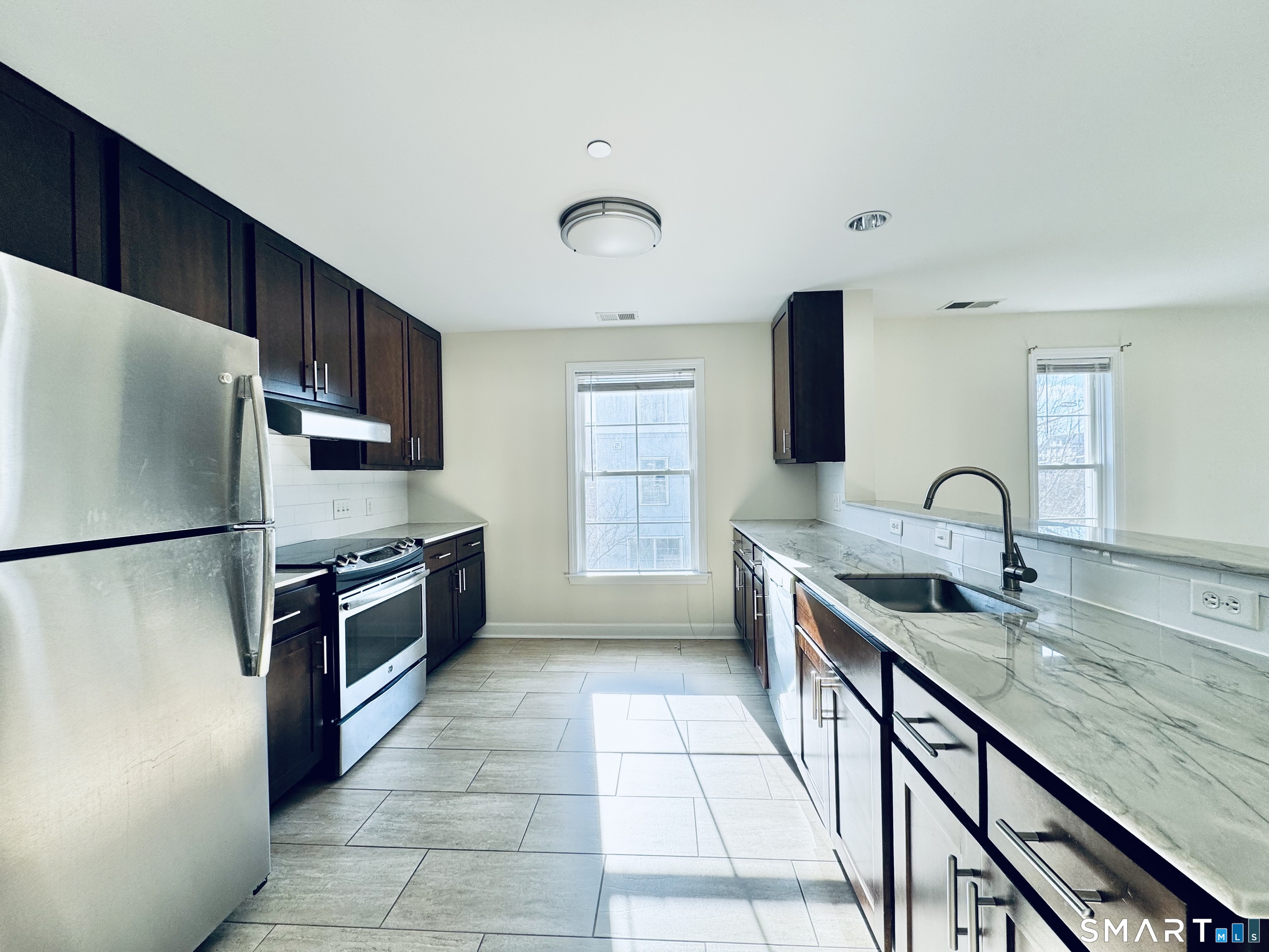 80 Merrell Avenue, Unit 80 Stamford, CT 06902 - Photo 4 of 14 Cool, Modern Kitchen