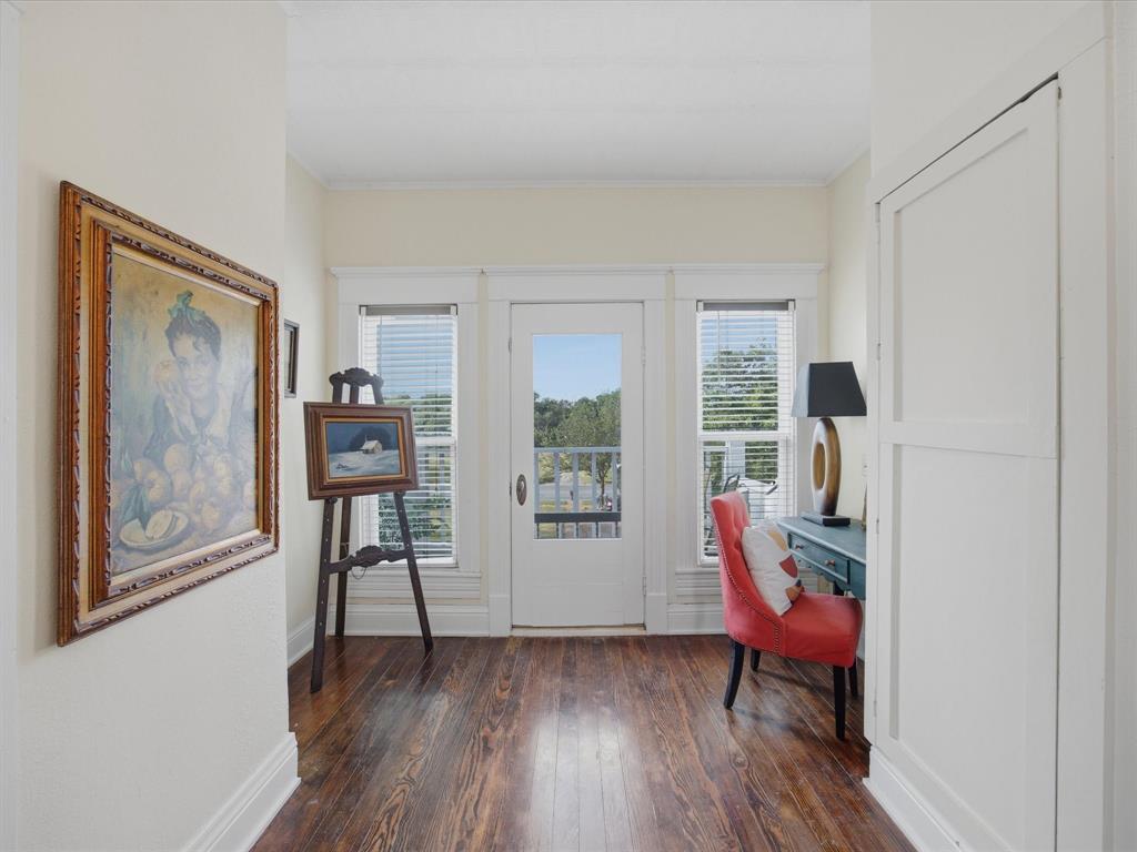 907 4th Street Graham, TX 76450 - Photo 17 of 34 a room with furniture and a window