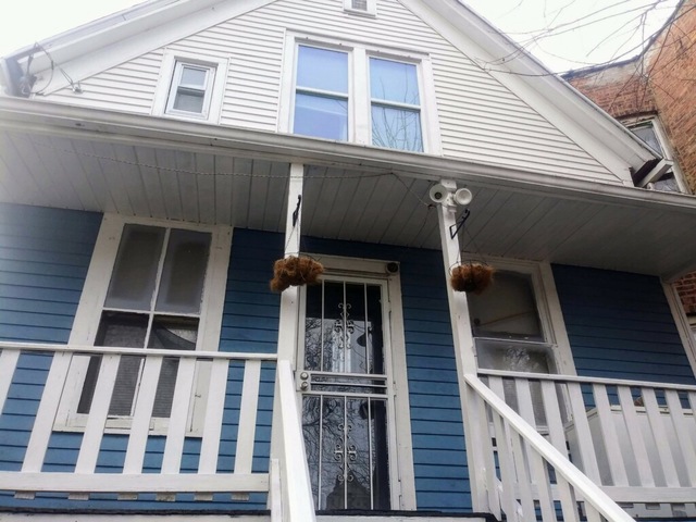 a building with a window and balcony