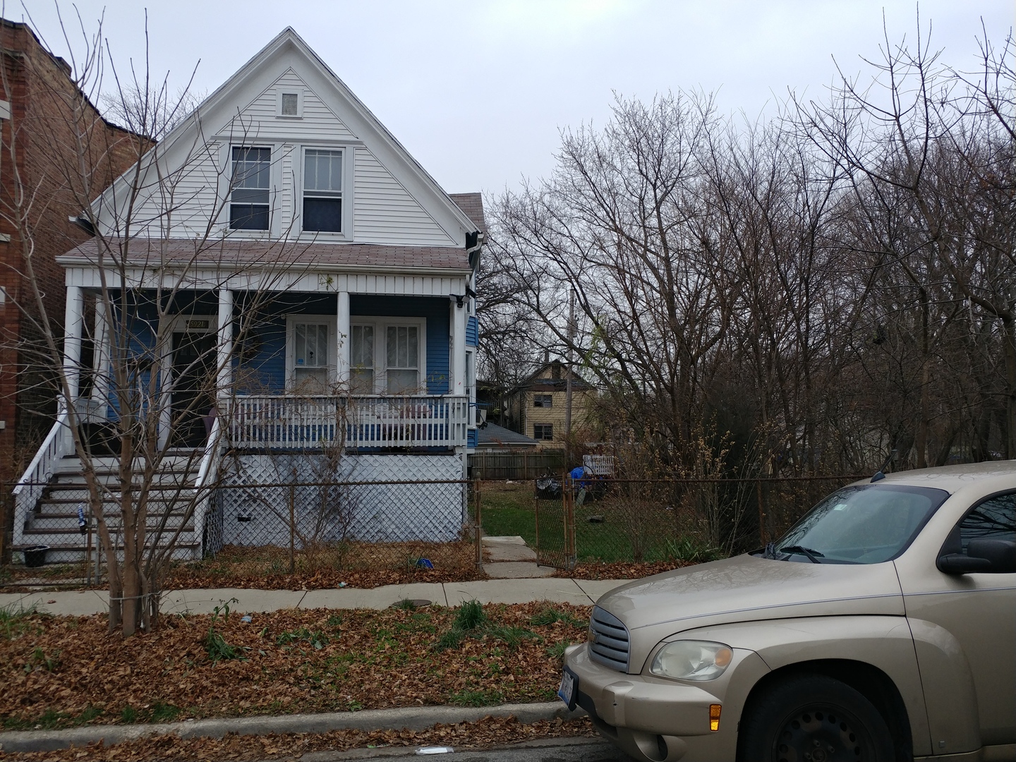 5921 South Aberdeen Street Chicago, IL 60621 - Photo 7 of 7 a front view of a house with garden