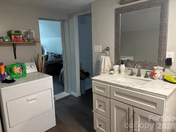 a utility room with dryer and washer