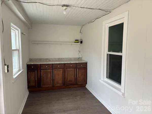 a hallway with windows