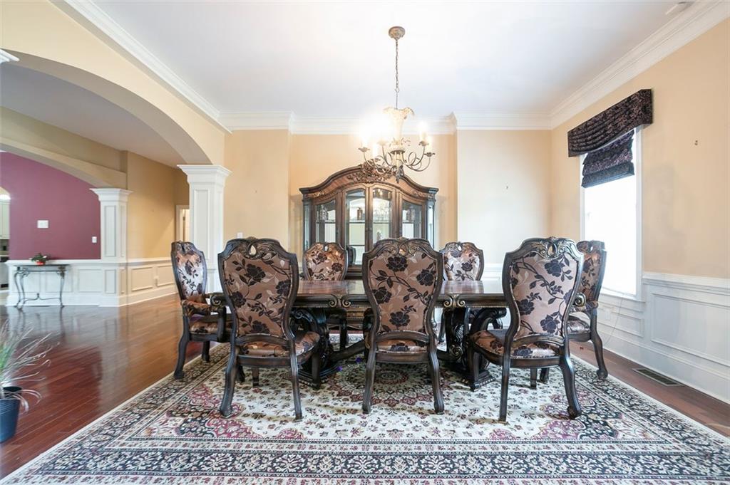 4370 Danforth Road Southwest Atlanta, GA 30331 - Photo 3 of 15 a view of a dining room and livingroom with furniture
