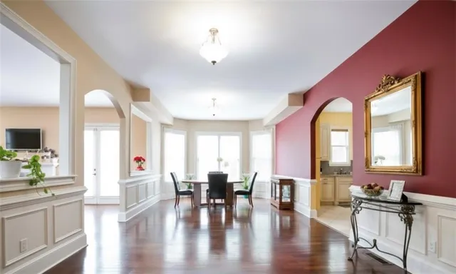 a view of a living room and dining room