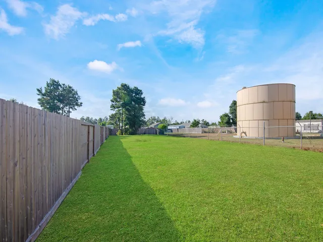 a picture of a bathroom with mirror