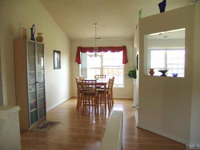 4808 Shallowbrook Trail Raleigh, NC 27616 - Photo 3 of 10 a view of a dining room with furniture window and outside view
