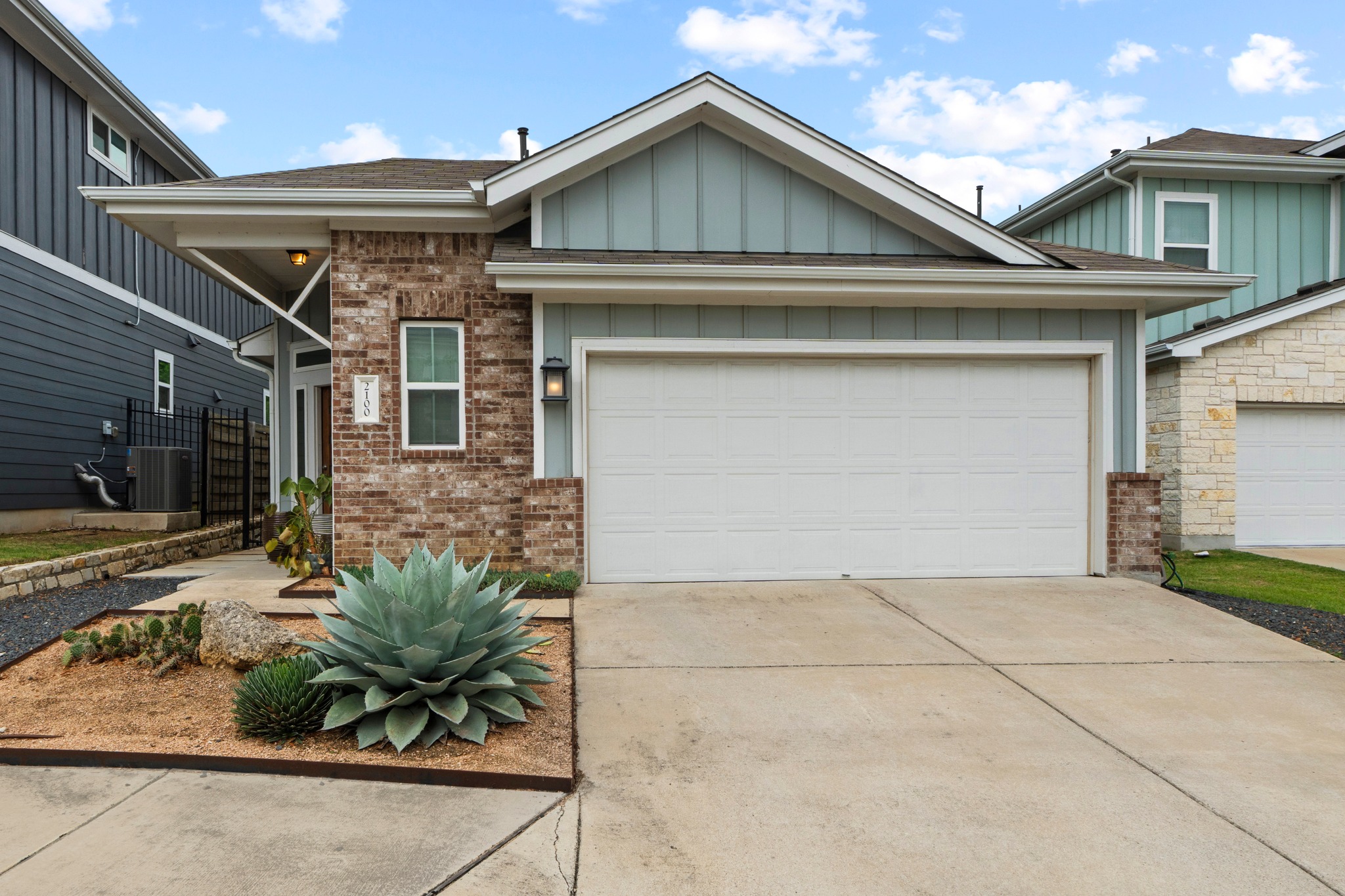 2100 Hermia Street, Unit 41 Austin, TX 78741 - Photo 22 of 22 a front view of a house with garden