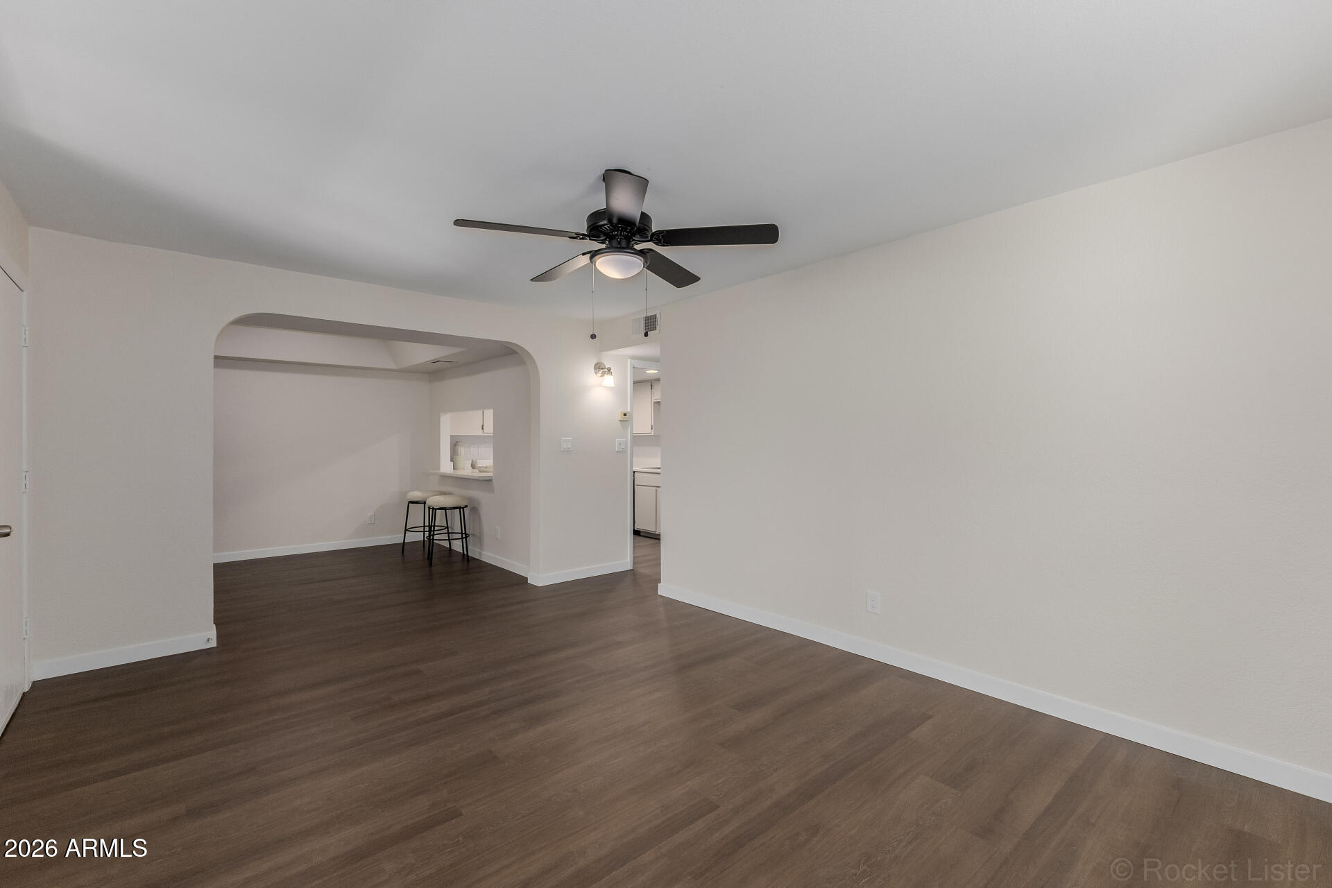 214 East Ruth Avenue, Unit 103 Phoenix, AZ 85020 - Photo 9 of 23 wooden floor in an empty room