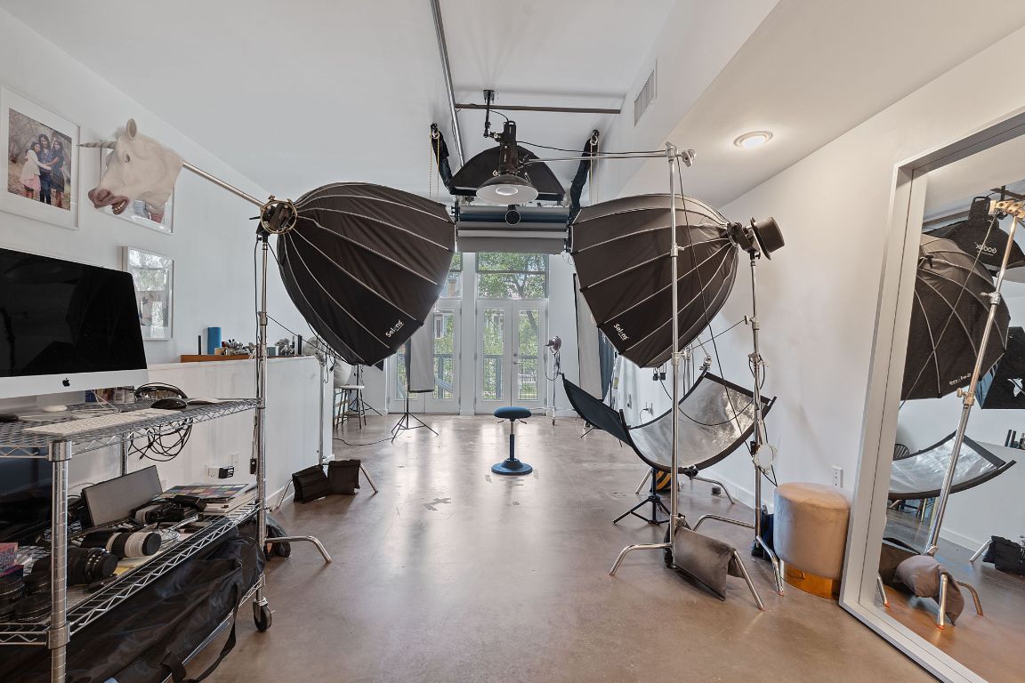 1601 East Cesar Chavez Street, Unit 104 Austin, TX 78702 - Photo 19 of 33 a view of a room with gym equipment