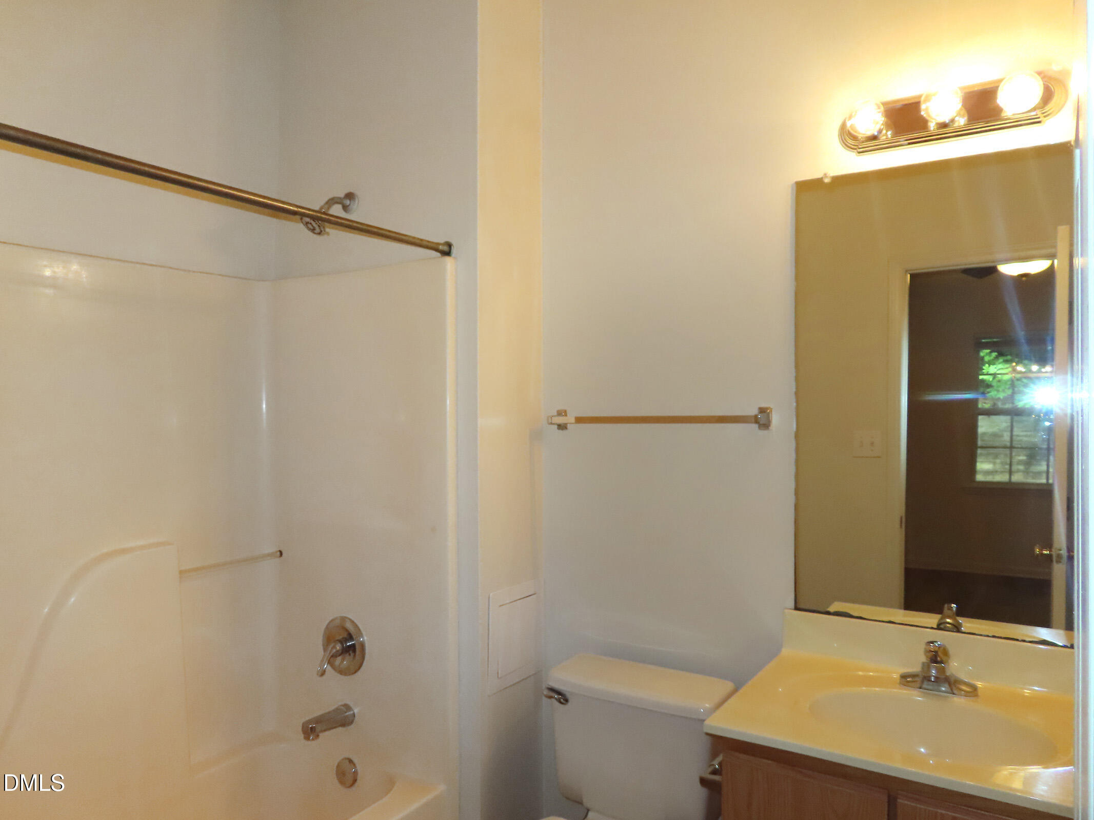 101 Rock Haven Road, Unit E500 Carrboro, NC 27510 - Photo 10 of 19 a bathroom with a sink and a mirror