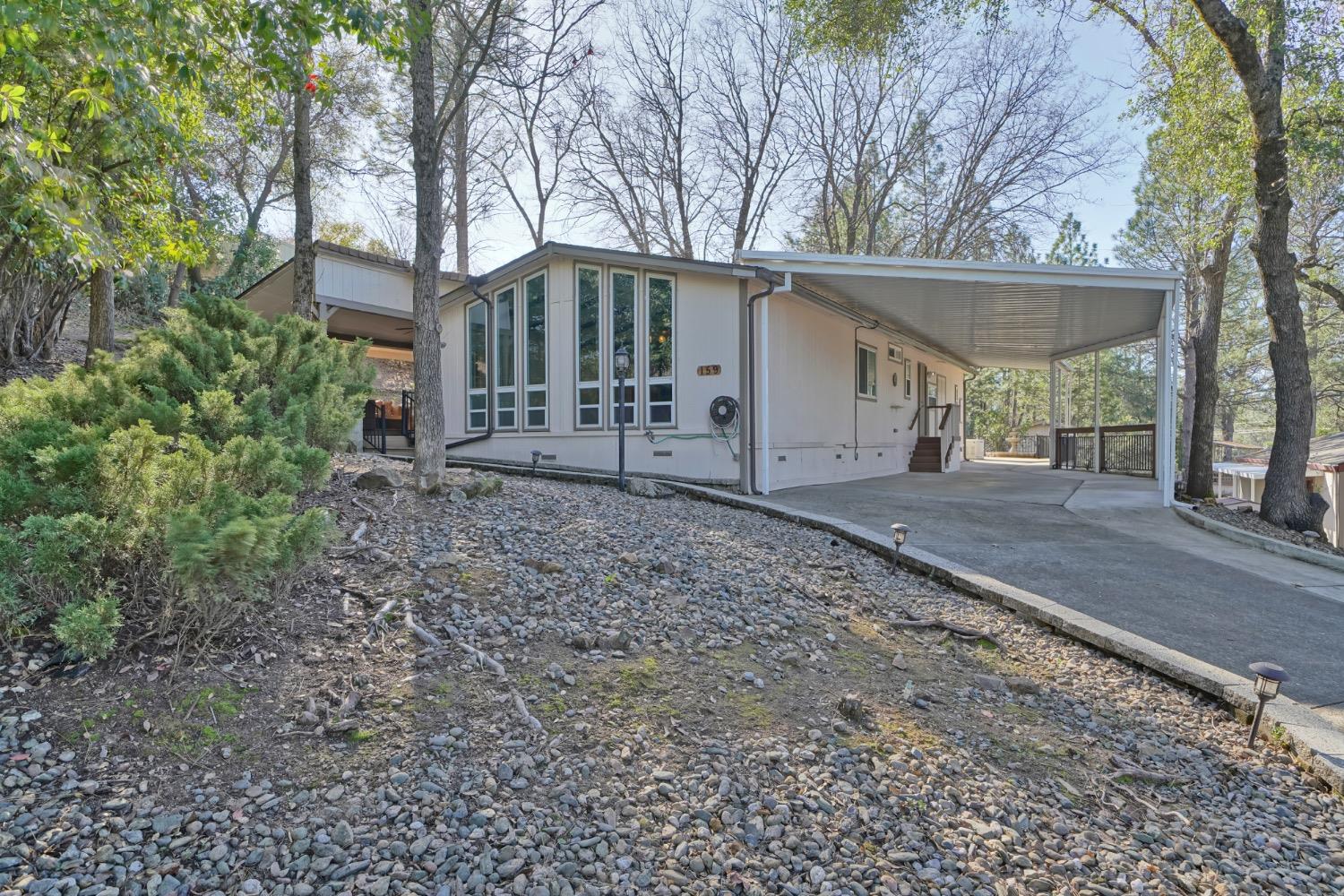 Welcome to you new home at 4420 Pleasant Valley Rd, Space #159, Diamond Springs. Located in the highly desirable Lake Oaks Senior Mobile Home Community