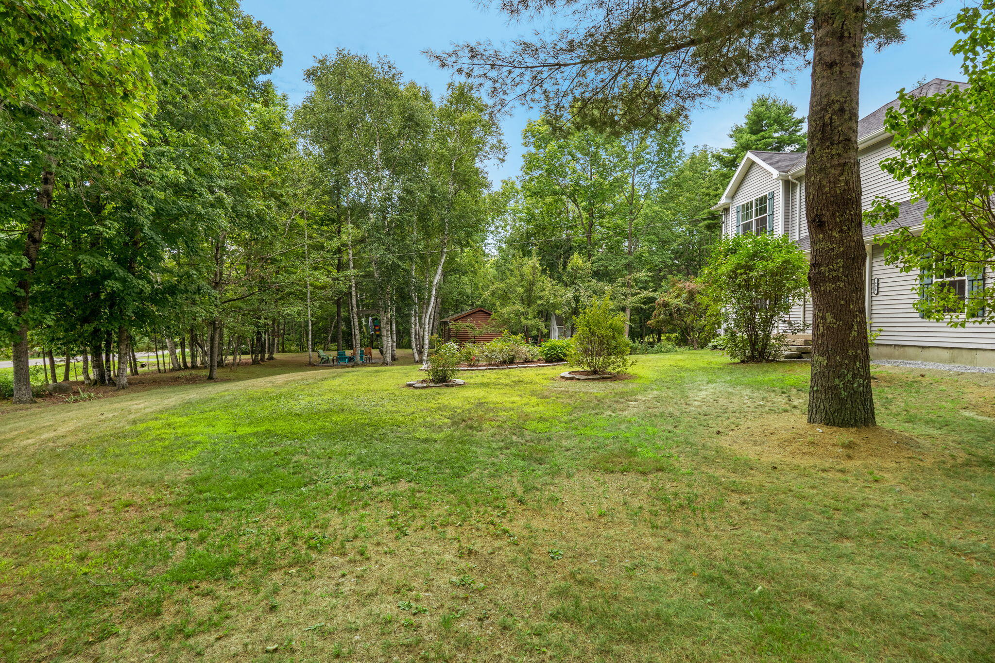 406 Brann Road Levant, ME 04456 - Photo 53 of 110 View from side- Back yard