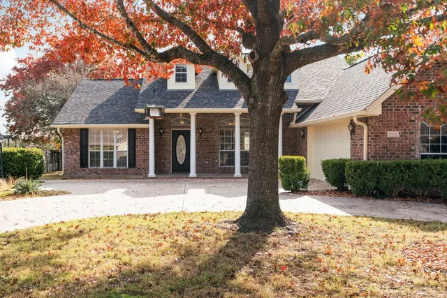 a front view of a house with a patio