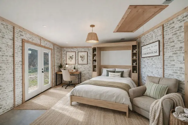 a kitchen with granite countertop a stove a sink and a refrigerator