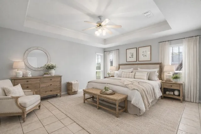 a spacious bathroom with a tub sink and mirror
