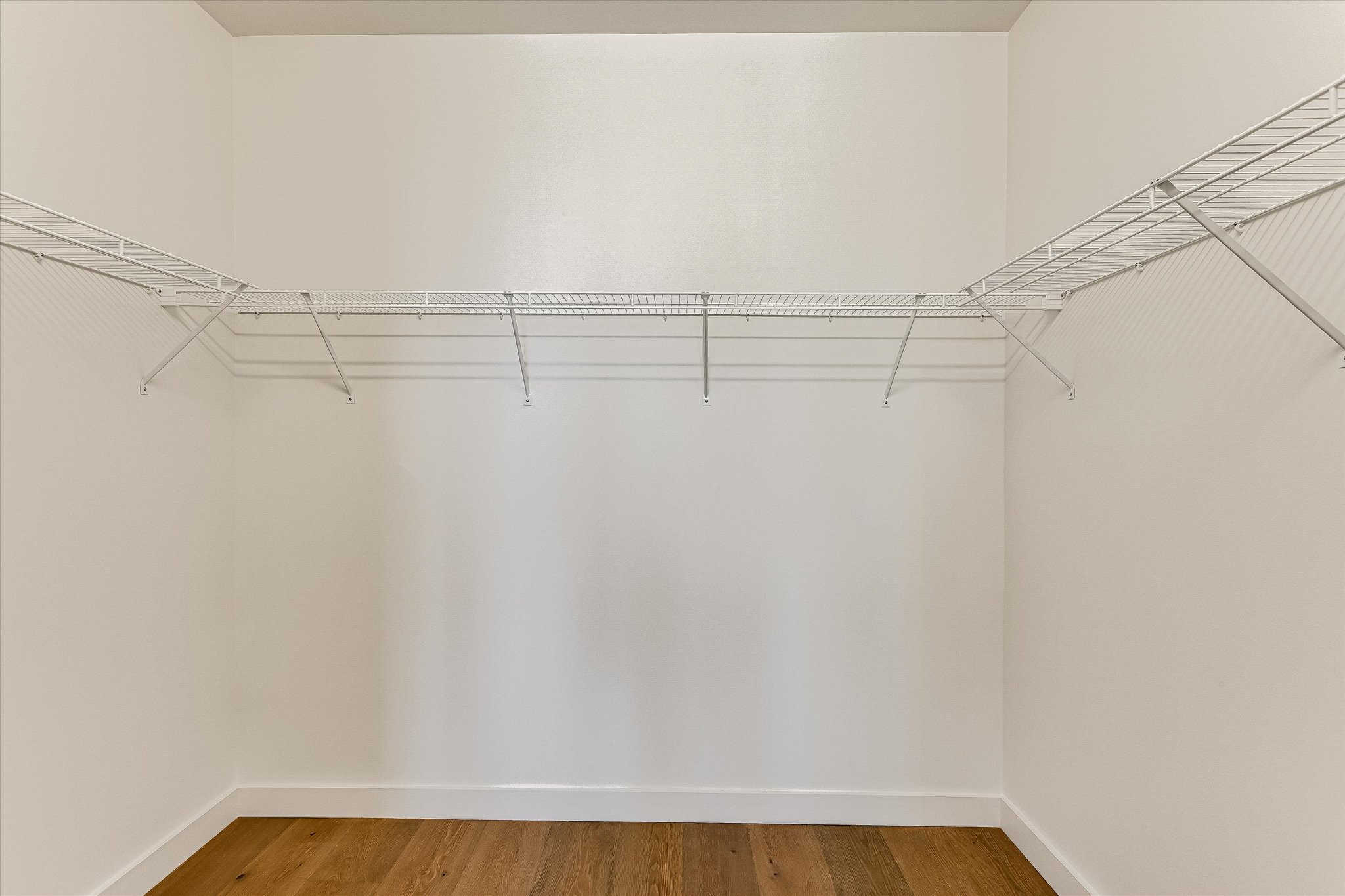 610 Davis Street, Unit 4501 Austin, TX 78701 - Photo 10 of 33 a view of a room with racks on the wall