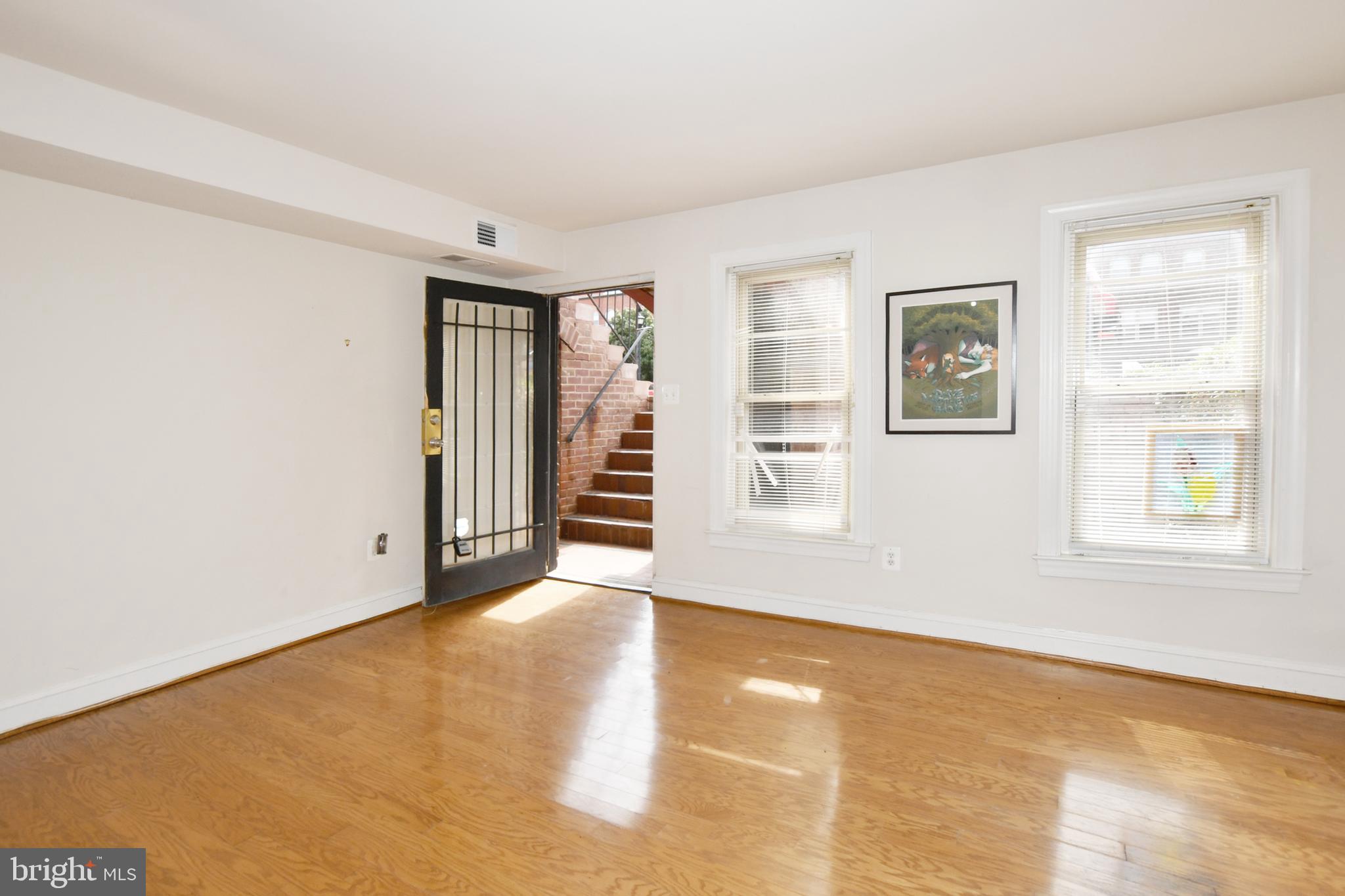 35 14th Street Northeast, Unit 35 Washington, DC 20003 - Photo 11 of 27 an empty room with windows