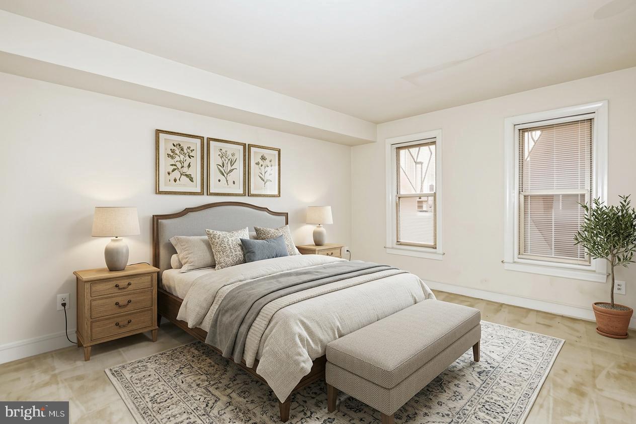 35 14th Street Northeast, Unit 35 Washington, DC 20003 - Photo 2 of 27 a bedroom with bed and window