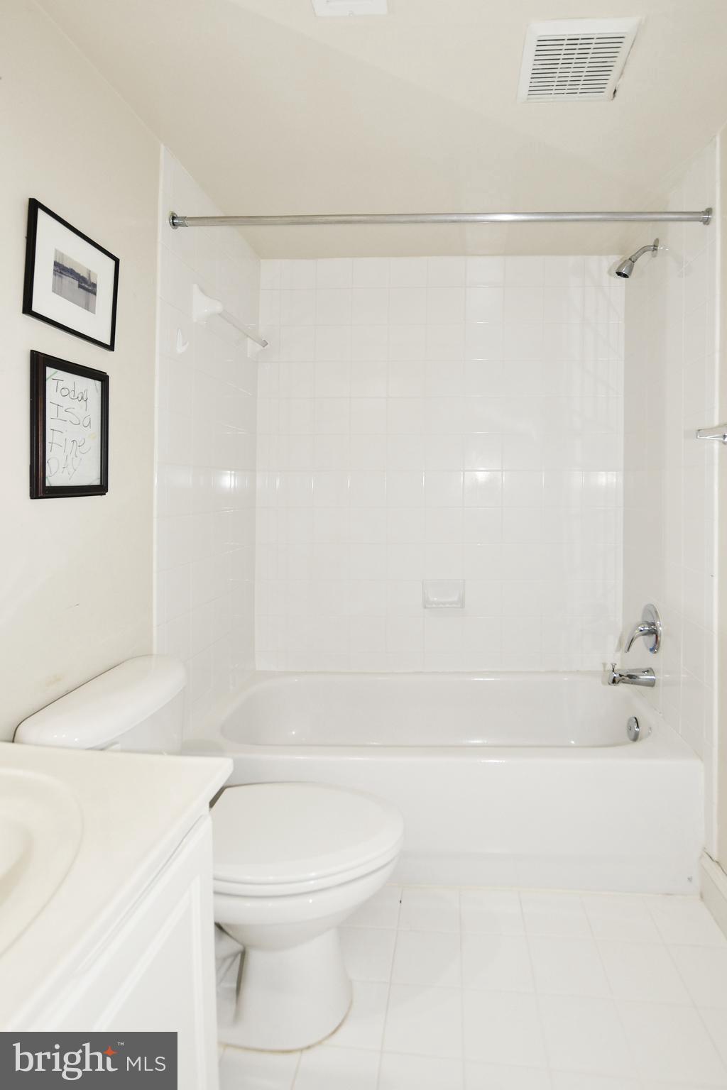 35 14th Street Northeast, Unit 35 Washington, DC 20003 - Photo 22 of 27 a bathroom with a shower and a toilet