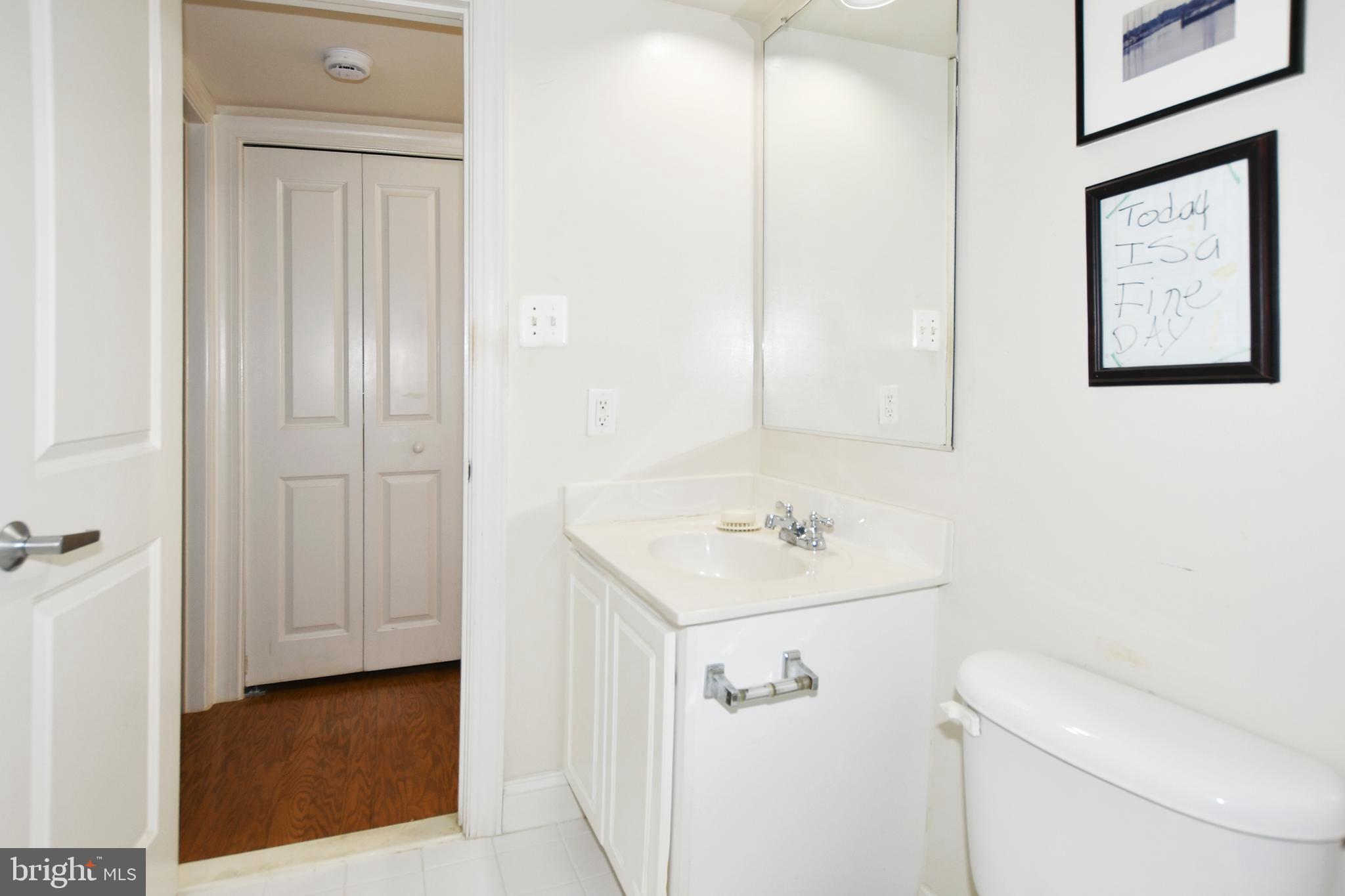 35 14th Street Northeast, Unit 35 Washington, DC 20003 - Photo 23 of 27 a bathroom with a shower toilet and sink
