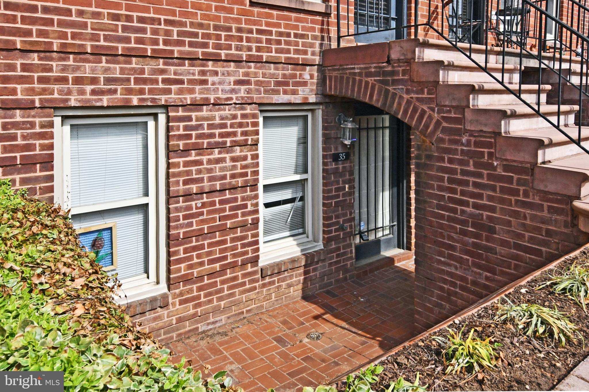 35 14th Street Northeast, Unit 35 Washington, DC 20003 - Photo 7 of 27 a view of a brick building with many windows