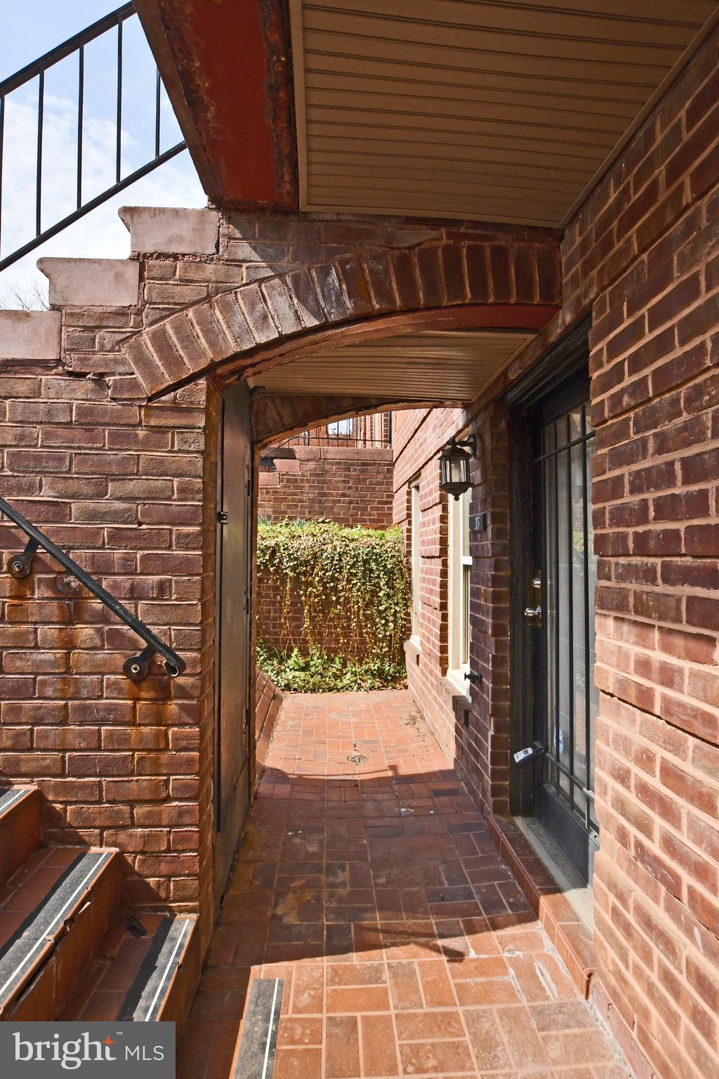 35 14th Street Northeast, Unit 35 Washington, DC 20003 - Photo 8 of 27 a view of a porch with a table and chairs