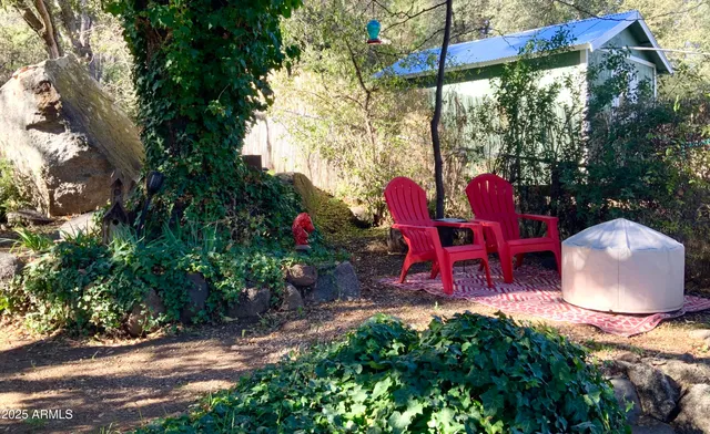 a backyard of a house with lots of green space