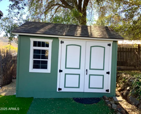 a view of sitting area in front of house