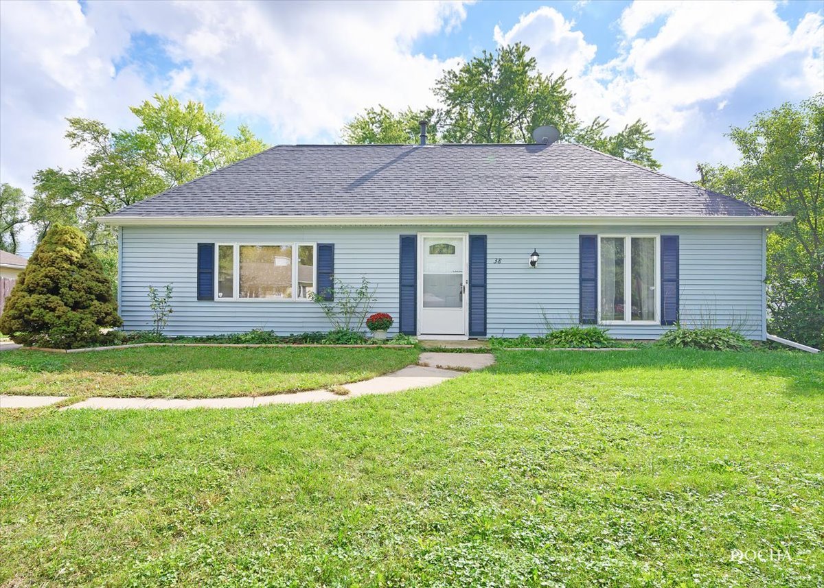 38 Pembrooke Road Montgomery, IL 60538 - Photo 1 of 16 a front view of a house with a garden