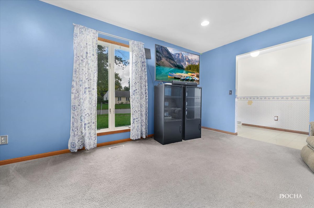 38 Pembrooke Road Montgomery, IL 60538 - Photo 2 of 16 a view of an empty room with a window