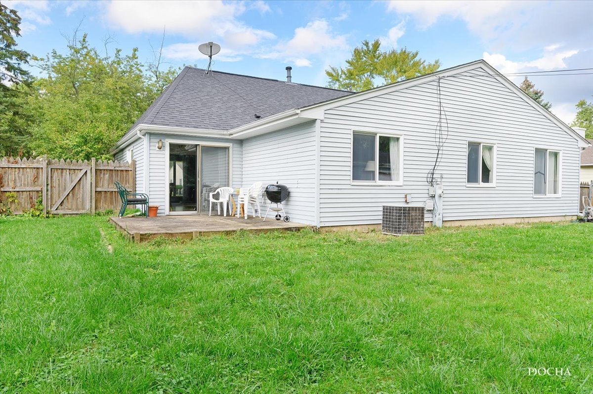 38 Pembrooke Road Montgomery, IL 60538 - Photo 16 of 16 a view of an house with backyard space and garden