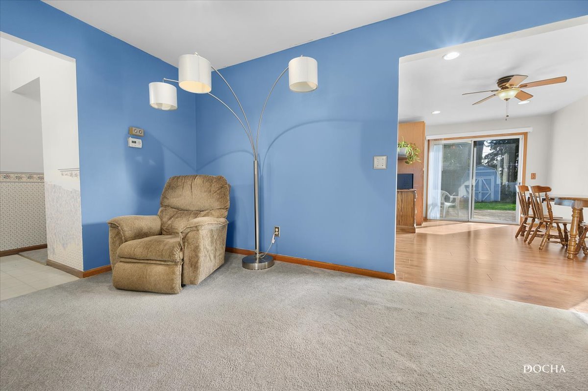 38 Pembrooke Road Montgomery, IL 60538 - Photo 3 of 16 a living room with furniture and wooden floor