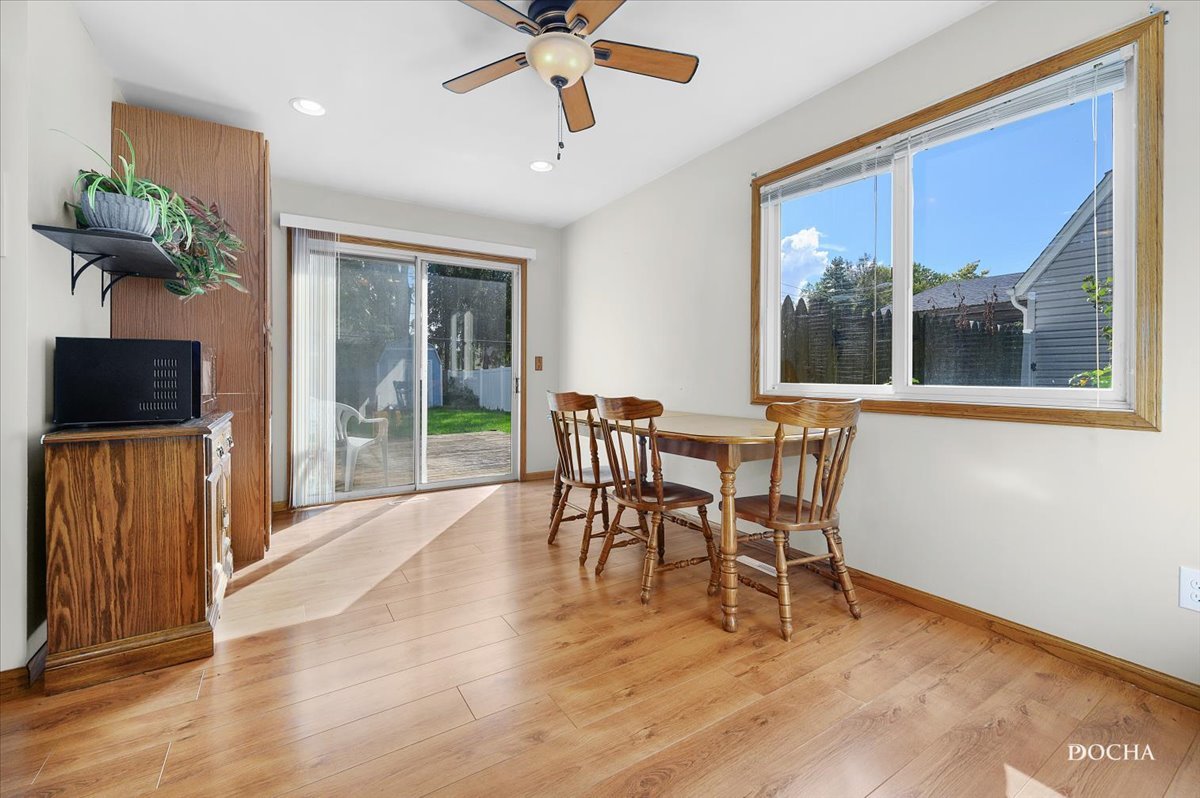 38 Pembrooke Road Montgomery, IL 60538 - Photo 4 of 16 a view of a dining room with furniture window and wooden floor