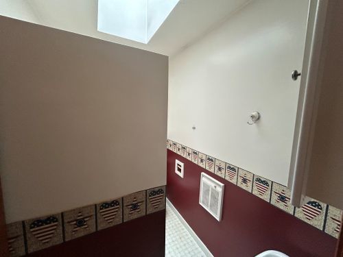 10940 South Dwight Road Dwight, IL 60420 - Photo 18 of 20 a view of an empty room with wooden floor