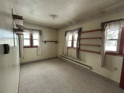 10940 South Dwight Road Dwight, IL 60420 - Photo 7 of 20 an empty room with windows