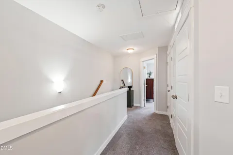 a view of a hallway with closet